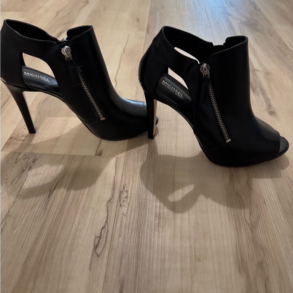 Michael Kors heels. Black with silver.. size 7.5